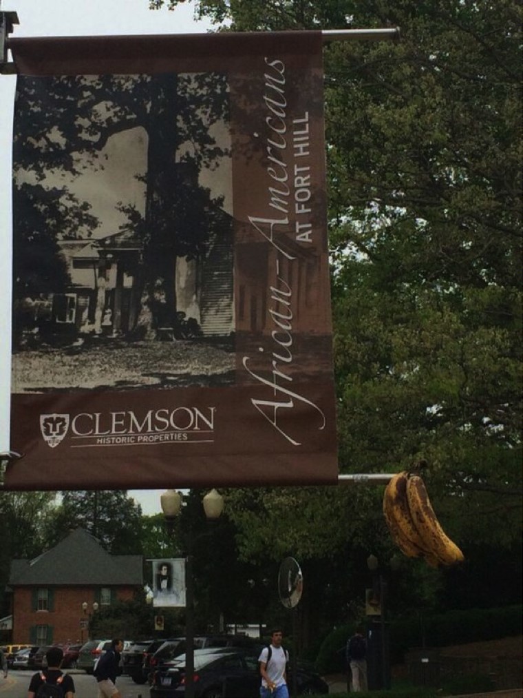 Bananas deface a banner celebrating African American heritage at Clemson.